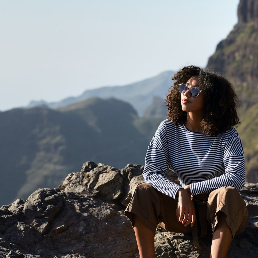 woman wearing Pala Lich frame in mountains