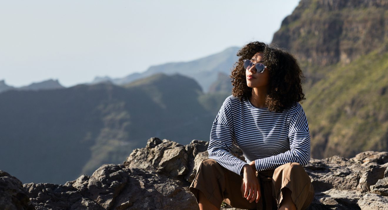 woman wearing Pala Lich frame in mountains