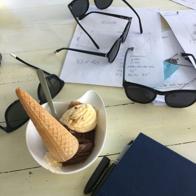 sustainable sunglasses on table alongside Italian ice-cream