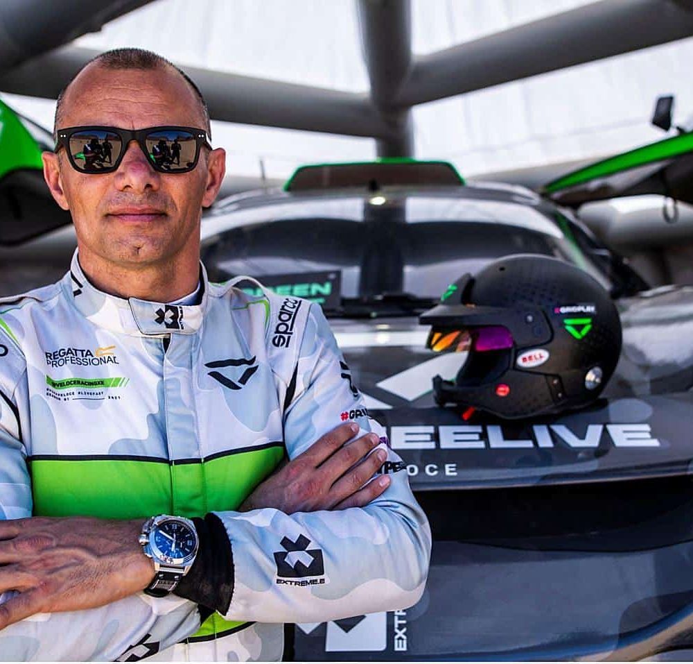 Veloce team driver wearing Pala sustainable sunglasses