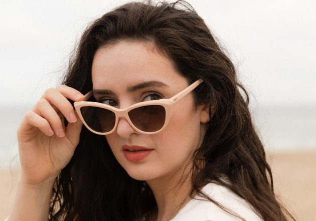 Sustainable living influencer Madeleine Olivia wearing Pala cat eye sunglasses