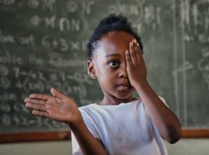 girl having an eye test in Ethiopia eye clinic