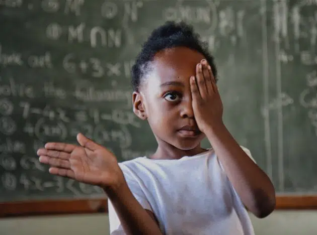 girl having an eye test in Ethiopia eye clinic