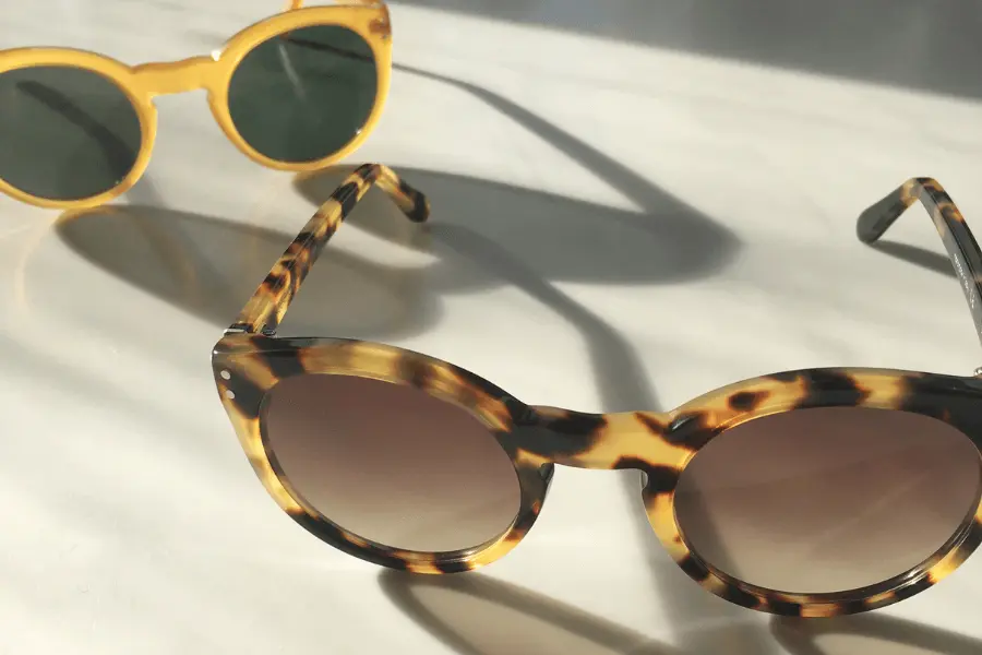 sustainable round sunglasses in tortoiseshell and yellow.