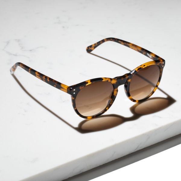 Asha Sunflower - Archive Sale 2 side angle of tortoiseshell round eco friendly sunglasses