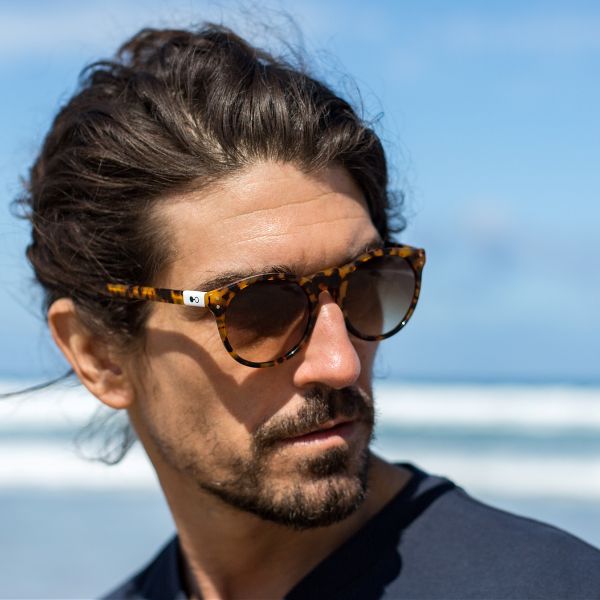 Asha Sunflower - Archive Sale 3 man wearing tortoiseshell round eco friendly sunglasses