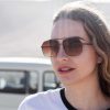 Itri Bronze - Archive Sale 3 woman wearing angular aviator sunglasses with brown lenses