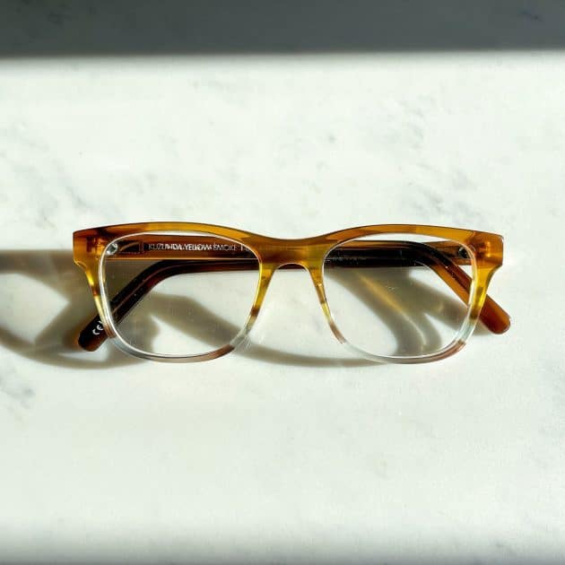 Yellow to crystal glasses frame in a strong square shape, ideal for men's glasses.