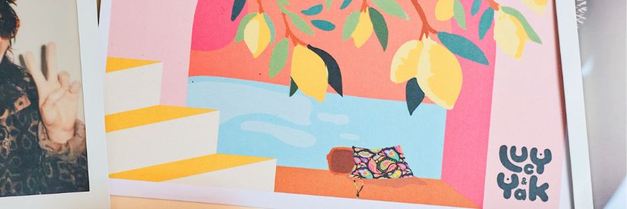 CLose up of the illustrated postcard that comes with every lucy & yak x Pala postcard featuring custom paisley case and and lemon tree.