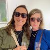 Two stylish middle aged women wearing glamorous oversized sunglasses - the Pala Thabo frame.